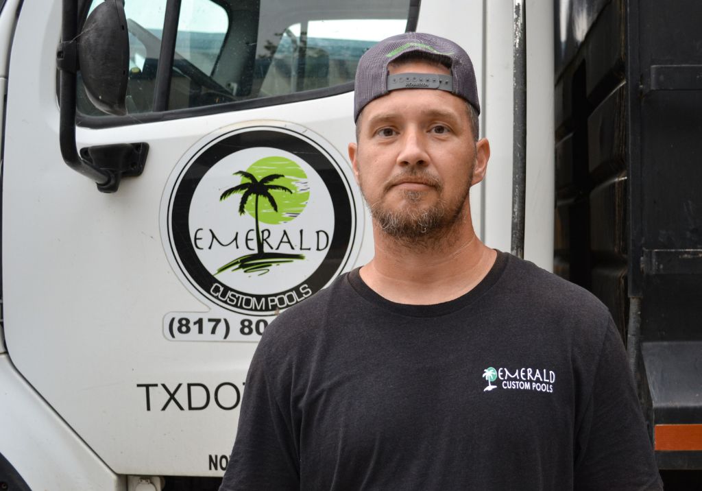 Man standing in front of construction truck