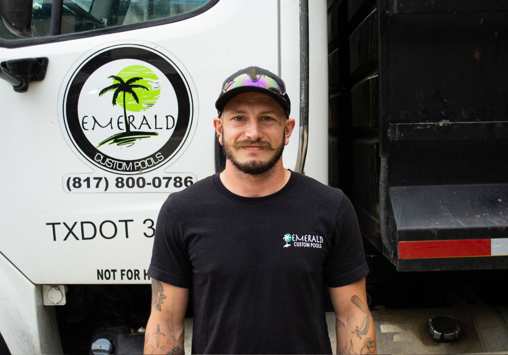 Man standing in front of construction truck