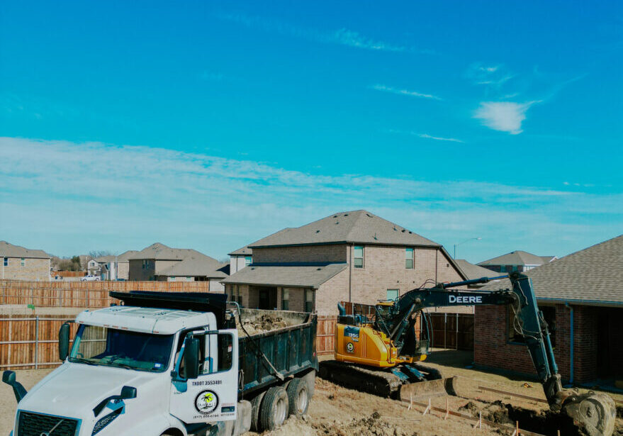 Pool construction company in-house crew on a job site.