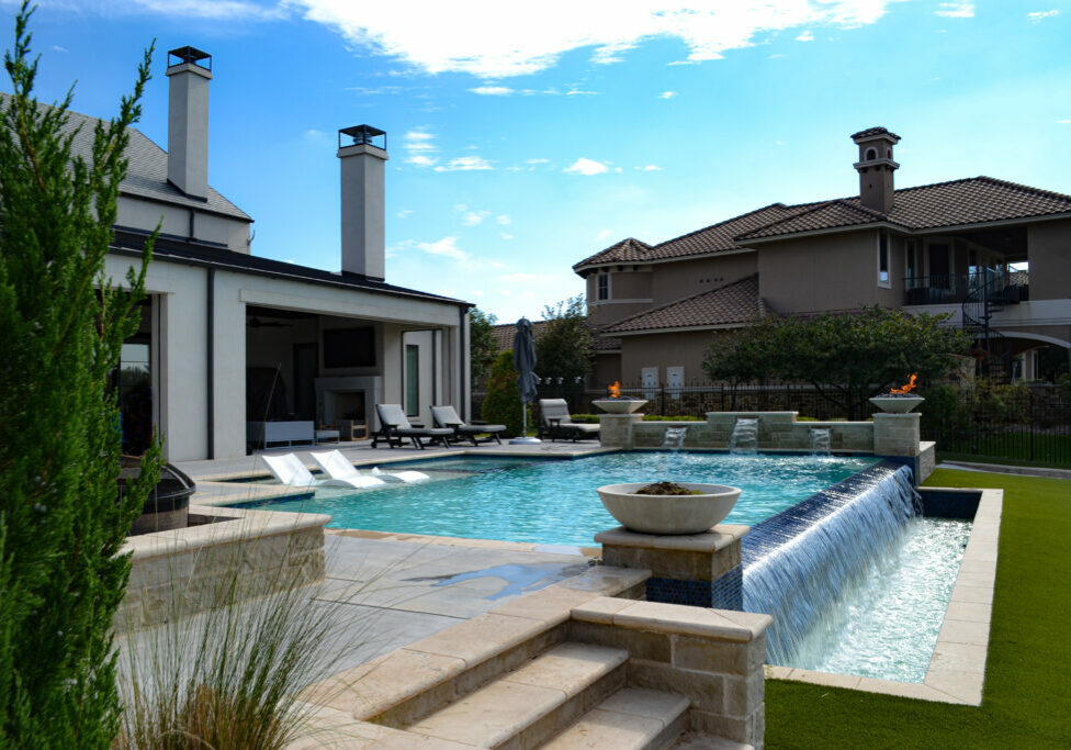 backyard swimming pool with turquoise pool water color
